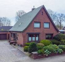 Charmantes Einfamilienhaus mit Einliegerwohnung auf großzügigem und sonnigem Grundstück in Fockbek