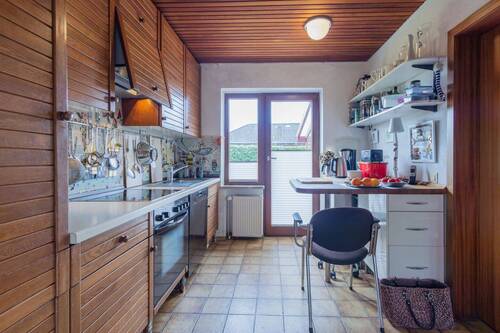 Küche mit Ausgang in den Garten - 