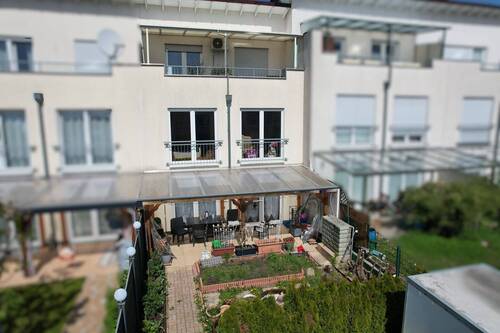 Hausansicht - Gepflegtes Reihenmittelhaus in Paderborn mit Südgarten, Terrasse und eigenem Carport
