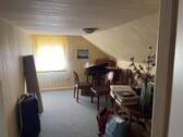 Zimmer im Dachgeschoss - 