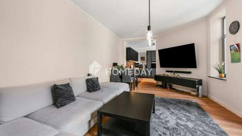 Wohnzimmer 2 - Modernes und stilvolles Wohnen in Stadtfeld Ost: möblierte 3-Zi.-Wohnung mit Balkon & Loggia
