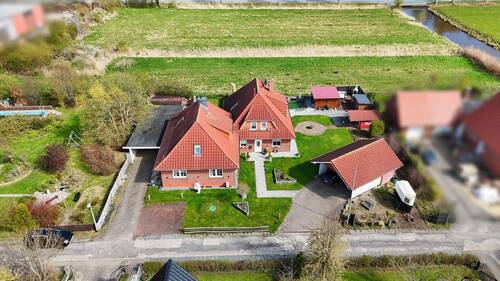 Luftansicht - 5 Zimmer Mehrfamilienhaus, Wohnhaus zum Kaufen in Loxstedt