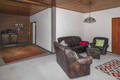 Wohnzimmer - 8 Zimmer Einfamilienhaus zum Kaufen in Brome