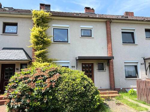 Bild 1 - PURNHAGEN-IMMOBILIEN - BlumenthalLüssum, Reihenmittelhaus mit Doppelgarage in ruhiger Wohnlage