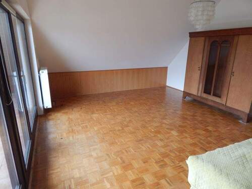 Wohn-/Schlafzimmer im OG - 