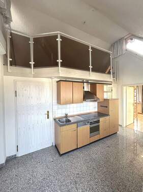 Küche mit Blick zur Galerie - Etagenwohnung mit 58,00 m&sup2; in Kirchzarten zum Kaufen