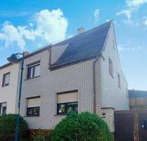 Raum für Visionen - Vermietete Doppelhaushälfte mit Nebengelassen, Garten und Garage - Krostitz