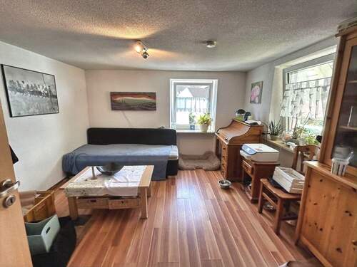 Obergeschoss: Zimmer mit Schwedenofen - 