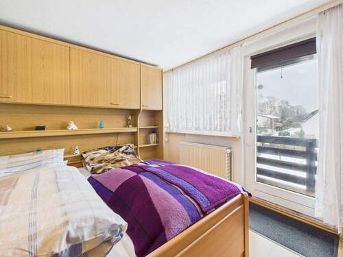 Schlafzimmer mit Balkonzugang - 