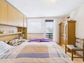 Schlafzimmer mit Balkonzugang - 