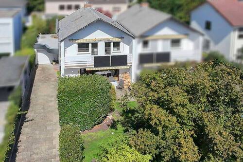 Außenansicht - 'Familienidyll mit Kamin und Garten - Ihr Zuhause in Hanau Hohe Tanne'