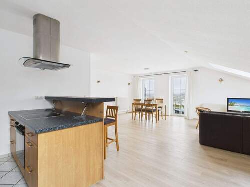 Wohnzimmer mit offener Küche - Etagenwohnung mit 68,00 m&sup2; in Fehmarn zum Kaufen