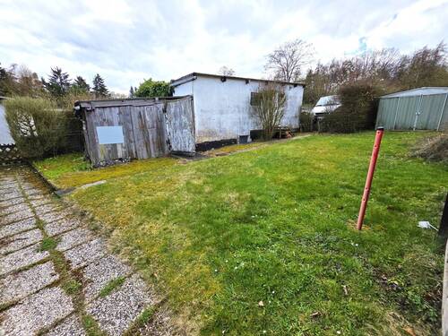 Garage mit darunterliegender Waschküche - Reihenendhaus mit 123,00 m&sup2; in Espenau / Schäferberg zum Kaufen