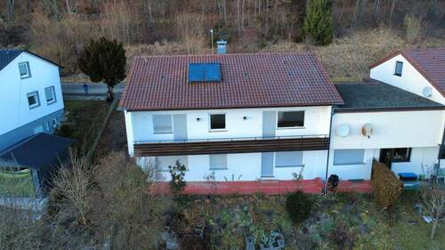 Rückseite mit einem Gartenteil - 