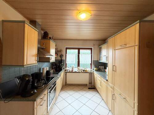 Küche - Mehrfamilienhaus, Wohnhaus mit 200,00 m&sup2; in Sponheim zum Kaufen