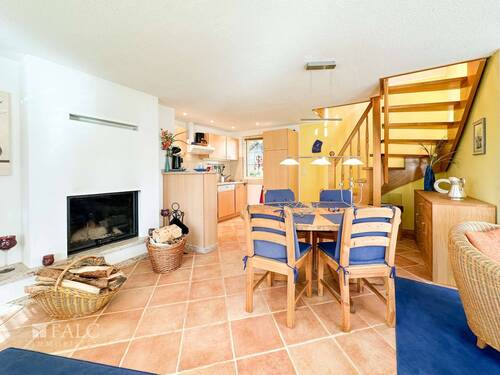 Wohnzimmer Wohnung rechts - Einfamilienhaus mit 125,00 m&sup2; in Wustrow zum Kaufen