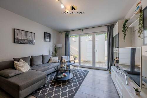 Gemütlicher Wohnbereich der Einliegerwohnung – ein komfortabler Rückzugsort mit eigenem Charakter. - 