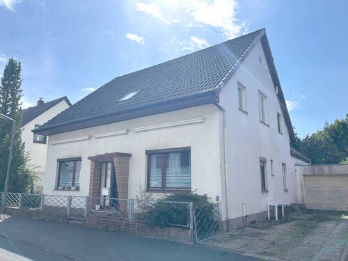 Bild 1 - PURNHAGEN-IMMOBILIEN - Freistehendes Einfamilienhaus mit Garage in ruhiger Lage von Bremen-Blumenthal!