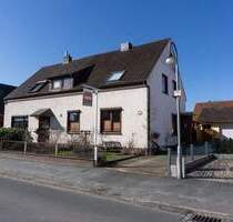 PURNHAGEN-IMMOBILIEN - Gepflegte Doppelhaushälfte mit Garage in ruhiger Lage von Blumenthal-Bockhorn - Bremen / Bockhorn Lüssum-Bockhorn