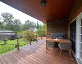 Terrasse Blick in den Garten - 2 Zimmer Mehrfamilienhaus, Wohnhaus zum Kaufen in Brandis