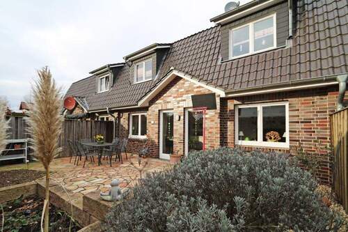 V1435 Terrassen-/Gartenansicht - Reihenmittelhaus mit 118,00 m&sup2; in Vechta zur Miete