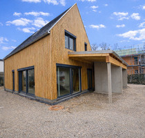 Gestalten Sie Ihr Traumhaus in einer der Top Lagen Ismanings am Isarhochufer als Ausbauhaus.