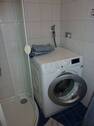 Die Waschmaschine im Bad - 