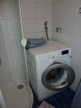 Die Waschmaschine im Bad - 