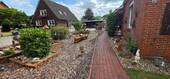Auffahrt - Einfamilienhaus mit 122,00 m² in Weener zum Kaufen