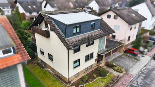 Bild 2 - 1 Zimmer Mehrfamilienhaus, Wohnhaus zum Kaufen in Bruchköbel