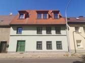 Hausansicht vorn - 3 Zimmer Etagenwohnung zum Kaufen in Delitzsch
