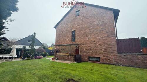 Gartenansicht - Mehrfamilienhaus, Wohnhaus mit 278,00 m&sup2; in Wunstorf zum Kaufen