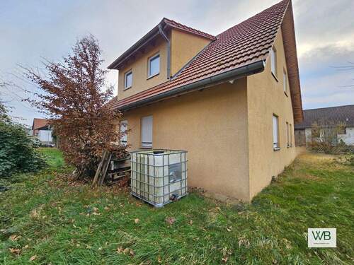 Haus Rückansicht - Mehrfamilienhaus, Wohnhaus mit 135,00 m&sup2; in Braunschweig / Waggum zum Kaufen