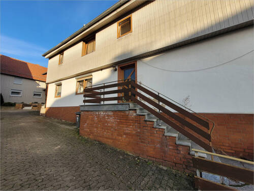 Hauseingang - Mehrfamilienhaus, Wohnhaus mit 176,00 m&sup2; in Krebeck zum Kaufen