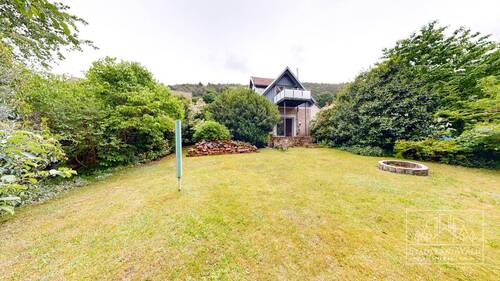Garten mit Blick auf Balkon und Terrasse - 