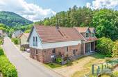 Luftbild - Haus-Straßenansicht - 4 Zimmer Einfamilienhaus in Schönau (Pfalz)