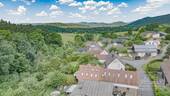 Luftbild - Haus mit Ausblick - Einfamilienhaus mit 147,00 m&sup2; in Schönau (Pfalz) zum Kaufen
