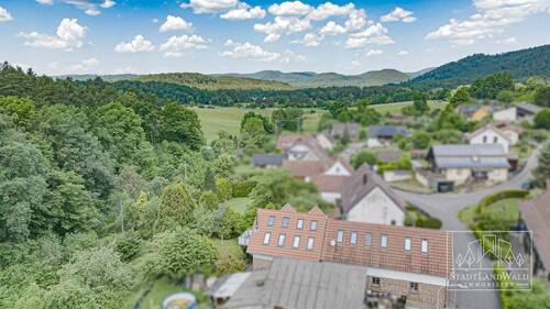 Luftbild - Haus mit Ausblick - Einfamilienhaus mit 147,00 m&sup2; in Schönau (Pfalz) zum Kaufen