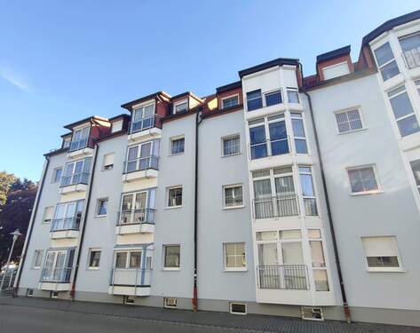 Bild 1 - Freistehende 2-Zimmer-Wohnung mit Tageslichtbad und Tiefgaragenstellplätzen