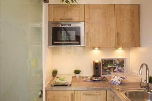 Eine Küche, die sich unaufdringlich einfügt und verzaubert - 