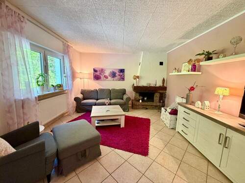 EG Wohnzimmer mit offenem Kamin - 