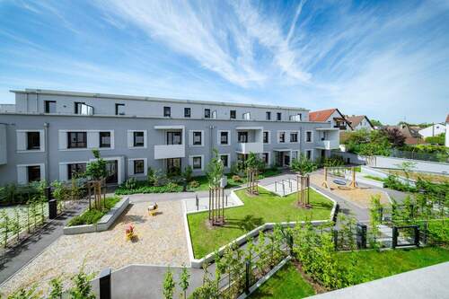 03_Foto_Aussenansicht ZGS Blick vom HausB in den F - 3 Zimmer Etagenwohnung in Augsburg