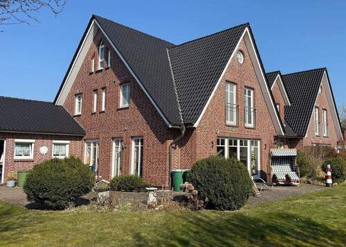 . - Exclusives Mehrfamilienhaus mit vier eleganten Wohneinheiten voll unterkellert