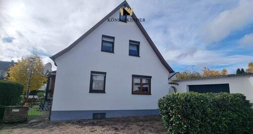 Giebelseite DHH - Vermietete Doppelhaushälfte in ruhiger Lage