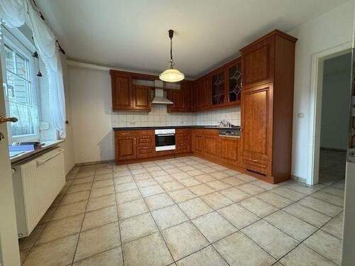 Küche mit Einbauküche - 