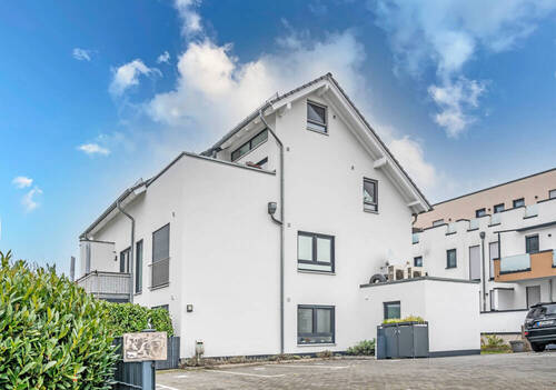 Hausansicht - Rarität: Ganz junges 6-Parteienhaus mit Energieeffizienzklasse A - Ein pflegeleichter Selbstläufer!