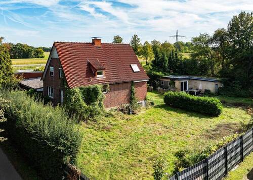 Seitenansicht - 6 Zimmer Einfamilienhaus zum Kaufen in Münster