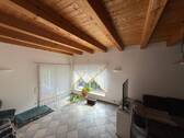 Wohnzimmer mit Holzbalken - 