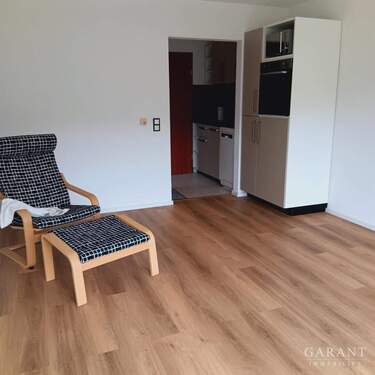 Ansicht mit Küchenzeile - Etagenwohnung mit 27,00 m&sup2; in Bad Urach zum Kaufen