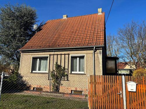 Bild 1 - Freistehendes Einfamilienhaus mit herausragendem Grundstück und vielseitigem Potenzial